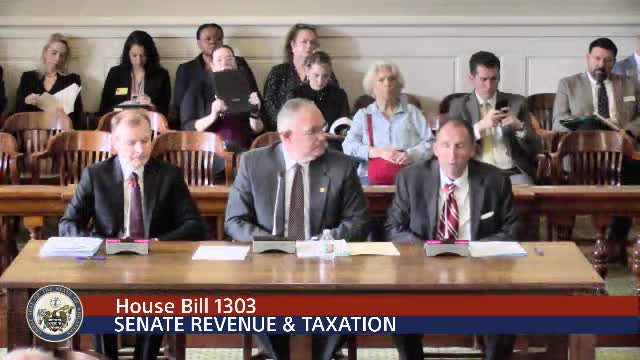 Committee adopts amendment removing state buyback from tax-credit package for renewable fuel project; bill then passed as amended