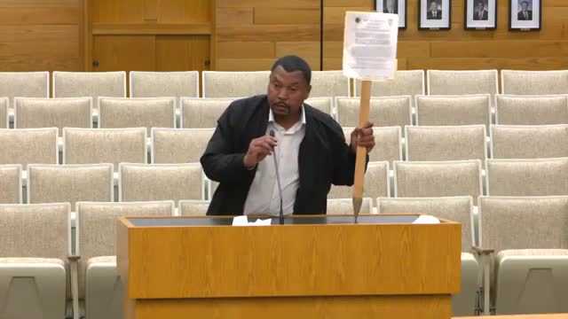 Resident Kevin Curry protests city of Cerritos code enforcement actions at council meeting