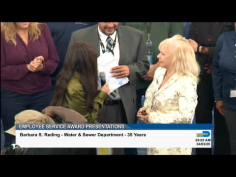 Brandon Garcia celebrates Barbara's 35 years of service at Miami Dade County