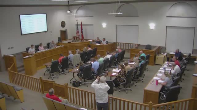 Carter County commissioners approve multiple disaster‑recovery payments, authorize engineering and school repair contracts