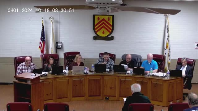 Fred Naylor confronts council over solar permit floodplain study delays
