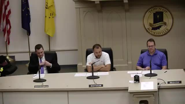 Mooresville redevelopment commission approves minutes and annual report amid storm recovery discussion