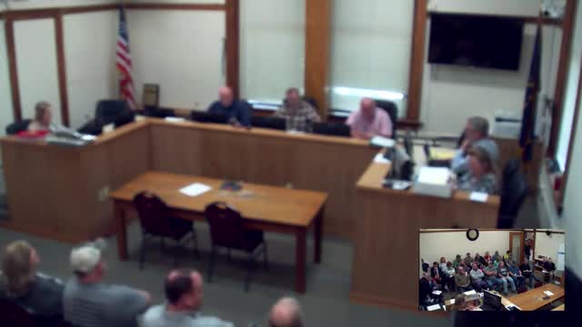 Commissioner Gary Burton emphasizes unity among officials at county meeting
