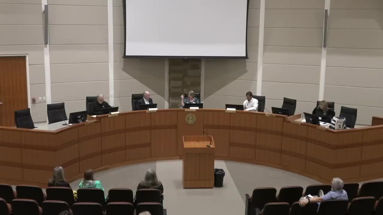 Tim Rogers leads prayer meditation for election board meeting