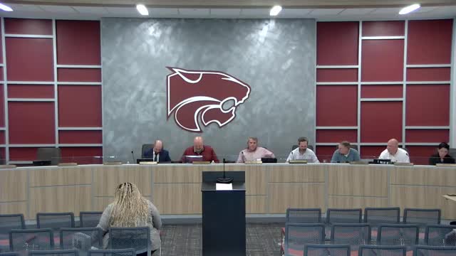 Pastor Kyle Whitmer leads community prayer at city council meeting