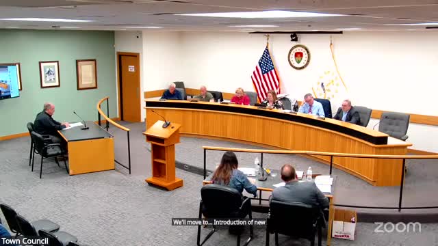 Steve Coleman explains distressed community designation at Coventry municipal meeting