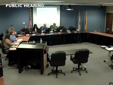 Commission approves three‑story self‑storage on Highland Avenue; neighbors say Sixth Ward already saturated