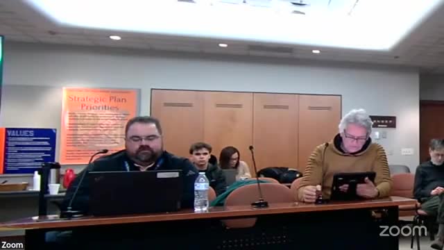 Board hears proposed change order for field infill and discusses board budget increases for legal fees and web services