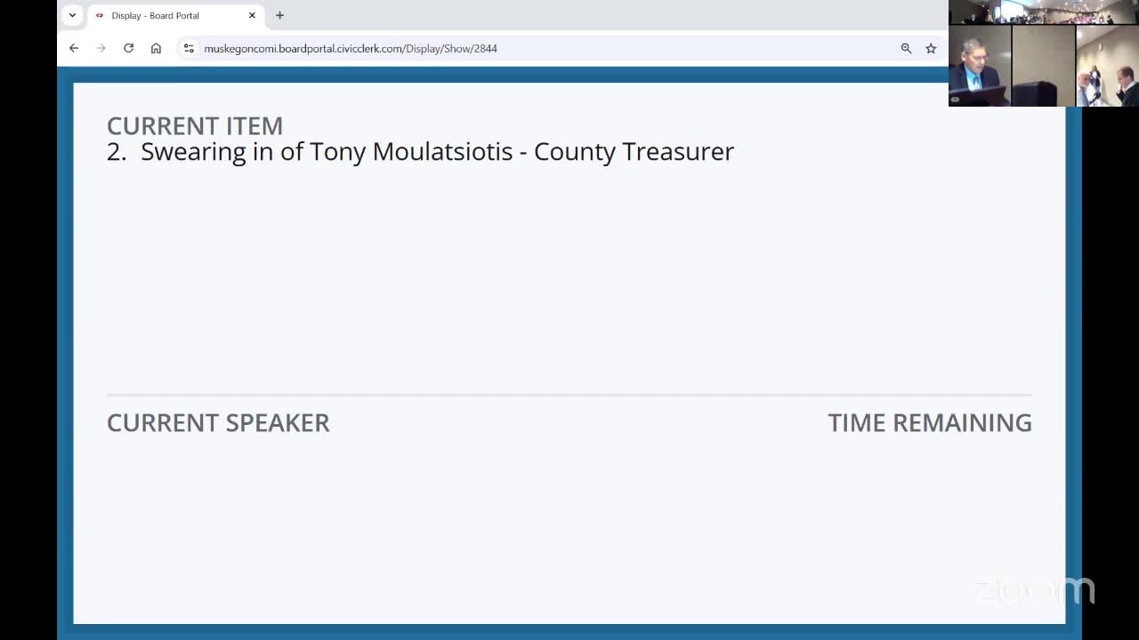 Tony Milatiolis sworn in as Muskegon County Treasurer by his father