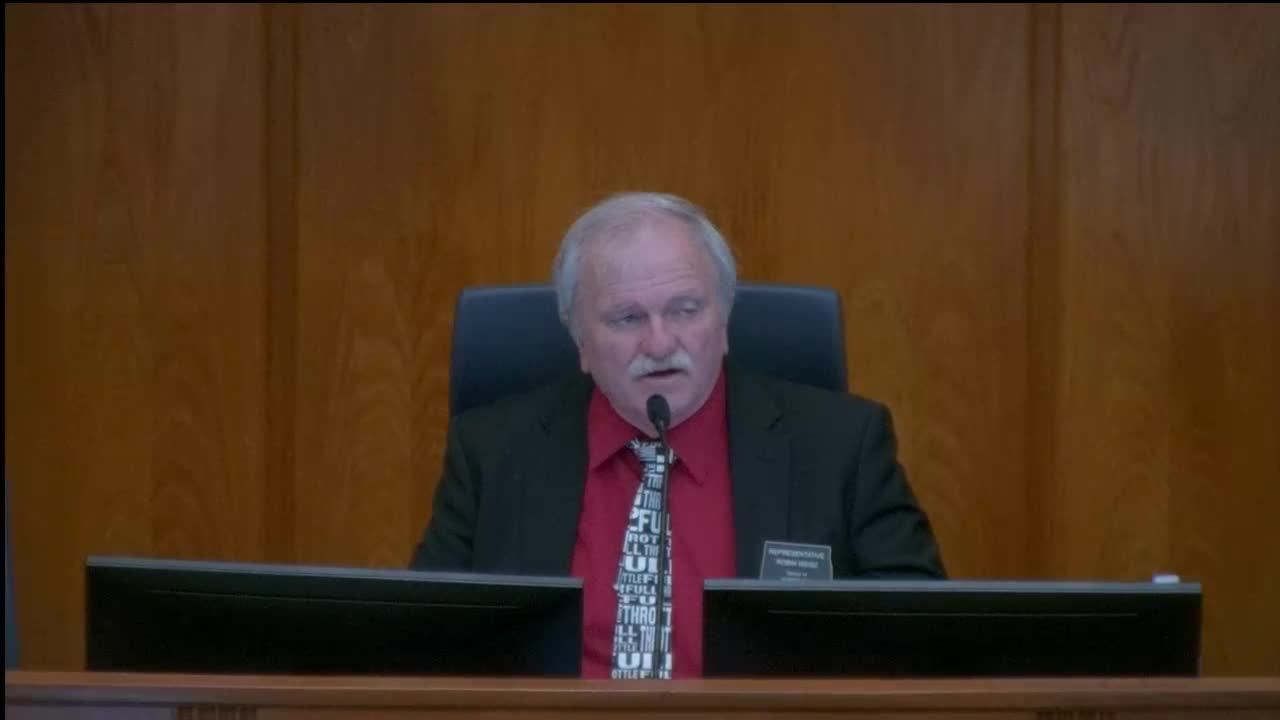 Father Stephen Better leads prayer for Bismarck legislative session