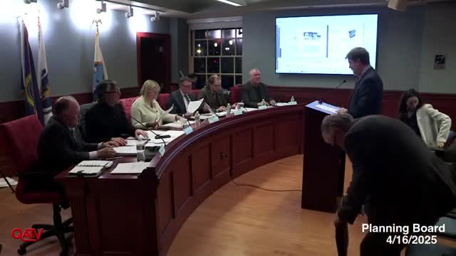 Trustee Steven Bayless presents revised housing plans to address community concerns