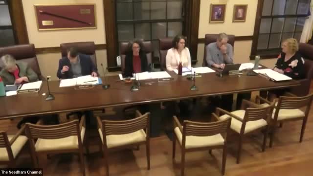 Joseph McCabe presents nuclear disarmament resolution petition at Needham town meeting