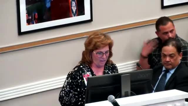 Parents and educators urge board to preserve librarians and CNI positions as budget cuts loom