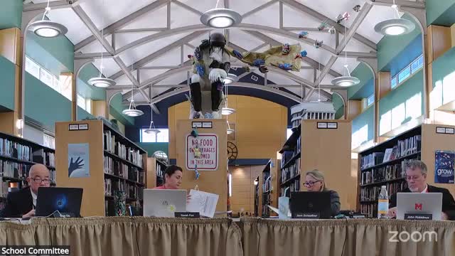 School committee holds public hearing on school choice; motion to opt out is moved and discussed