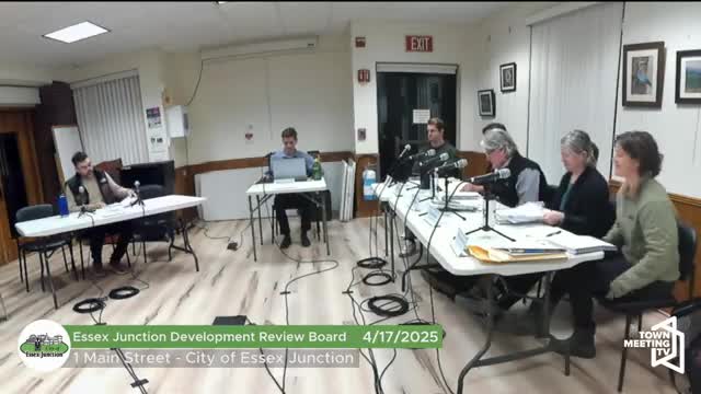 DRB grants variance for taller rear fence at 120 Main Street because of unique grade conditions