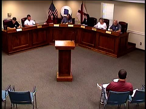 Covington County approves bridge contract, IT server placement, surplus sales and surface-treatment award; commissioners flag schedule concerns