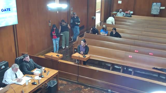 Resident protests city tree removal at public meeting