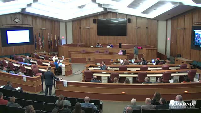UAW Local 889 leaders confront Oakland County officials over assessment rate hikes