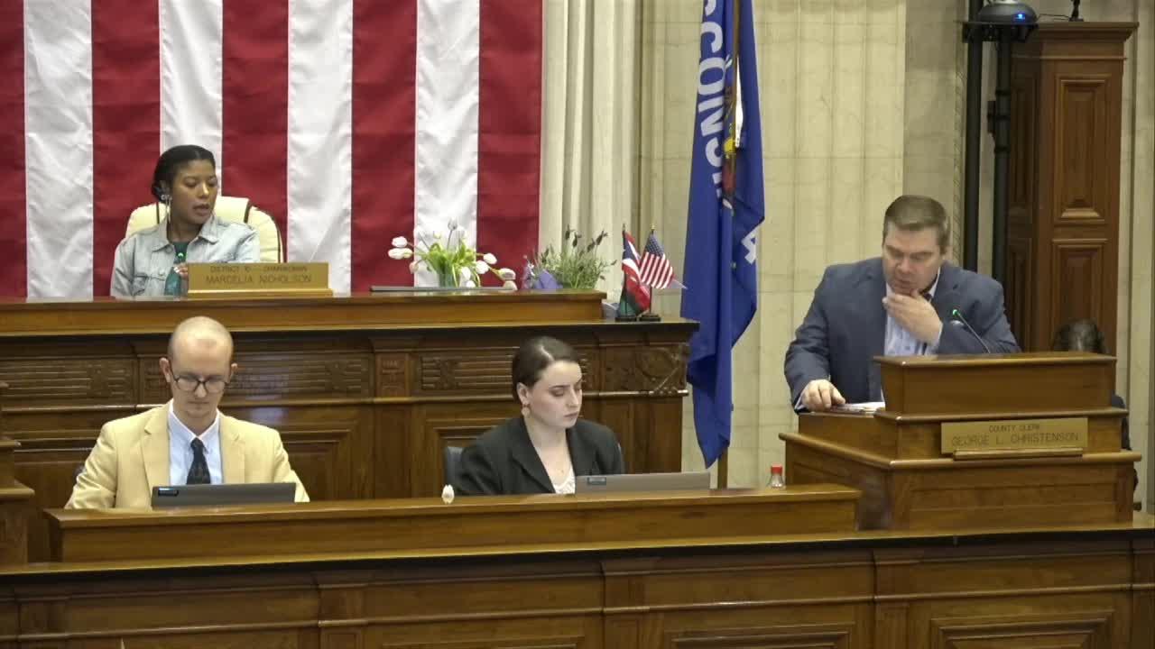 Cox Jones leads pledge and moment of silence at meeting
