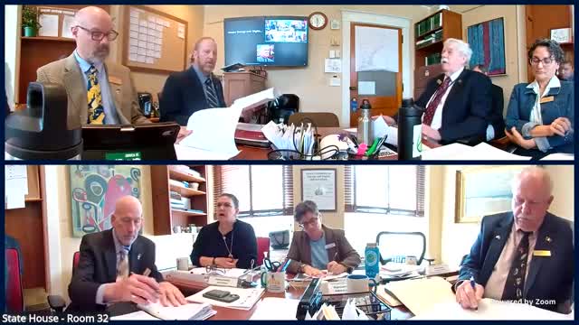 Representative Campbell discusses solar panel setback regulations with state committee members