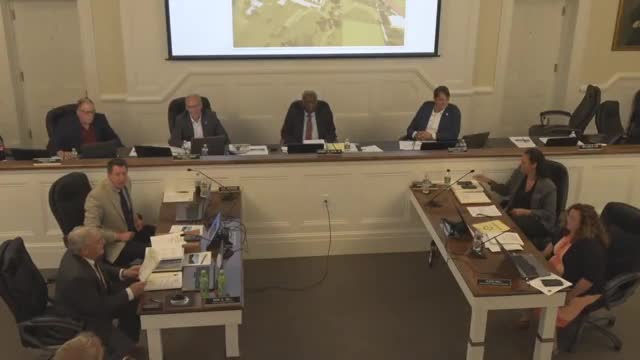 High-school construction progress: concrete pours, gym and track schedules noted