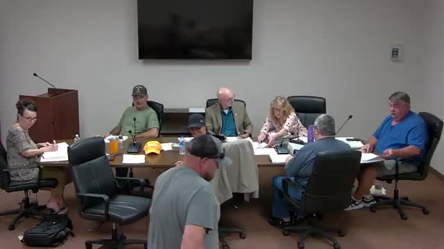 Committee approves road department budget amendment for subdivision paving and drainage work