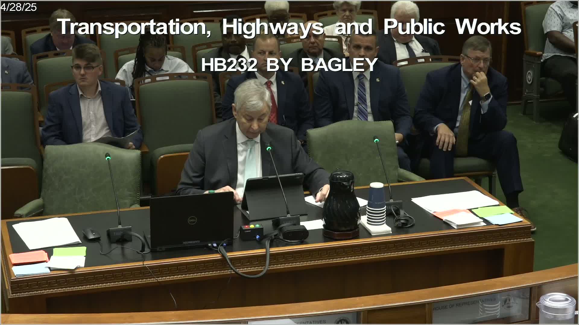 Panel rejects measure to eliminate vehicle inspection sticker; vote fails on roll call