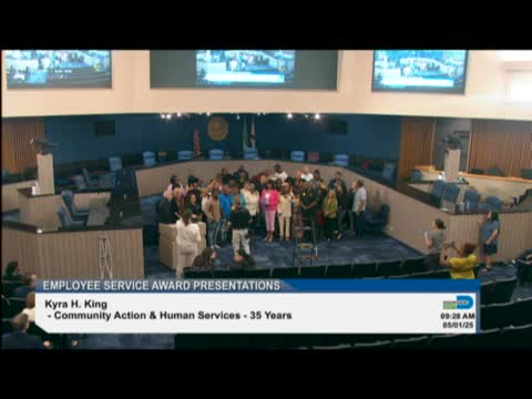 Community Action and Human Services department honors 35 year veteran librarian