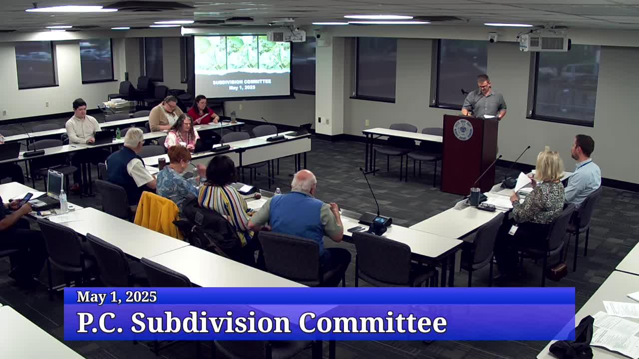 Subdivision plan for Lexington Center proposes five lots, new sidewalks and three parking garages; committee discussion focuses on pedestrian connections and on