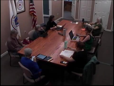 Library director reports April usage and previews new website; trustees note staffing and outreach metrics