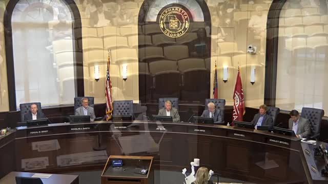 Alpharetta council delays decision on Charlotte Drive curb-and-gutter removal after drainage, maintenance concerns