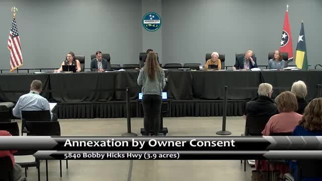 Commission approves preliminary resolution for 3.9-acre annexation for proposed DMV site amid debate over $290,637 sewer extension cost