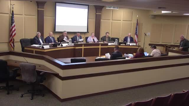 Commission tables site-alteration request for 7139 Hopkins Road, asks for clearer drawings and landscaping plan