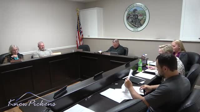 Town staff report on park maintenance and completed restroom renovation