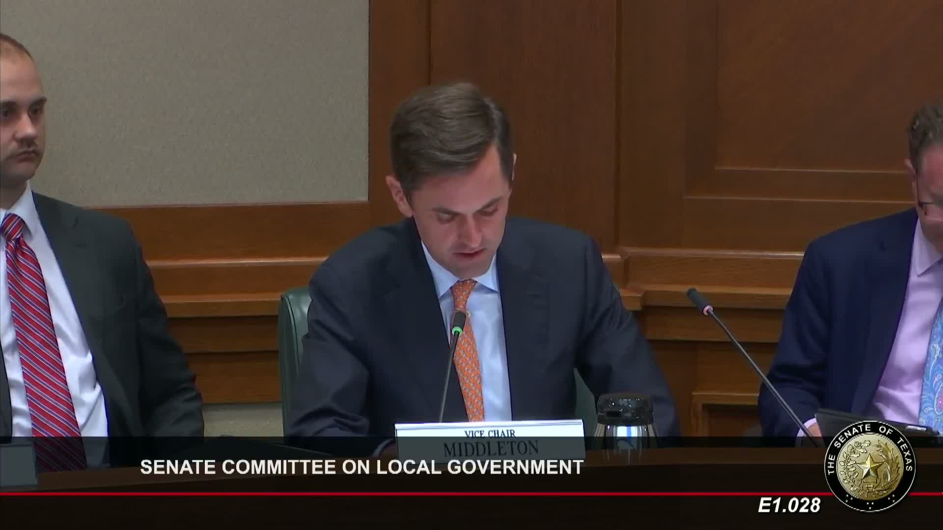 Committee hears sponsor and law‑enforcement witnesses supporting lower population threshold to block petitions removing municipal civil service