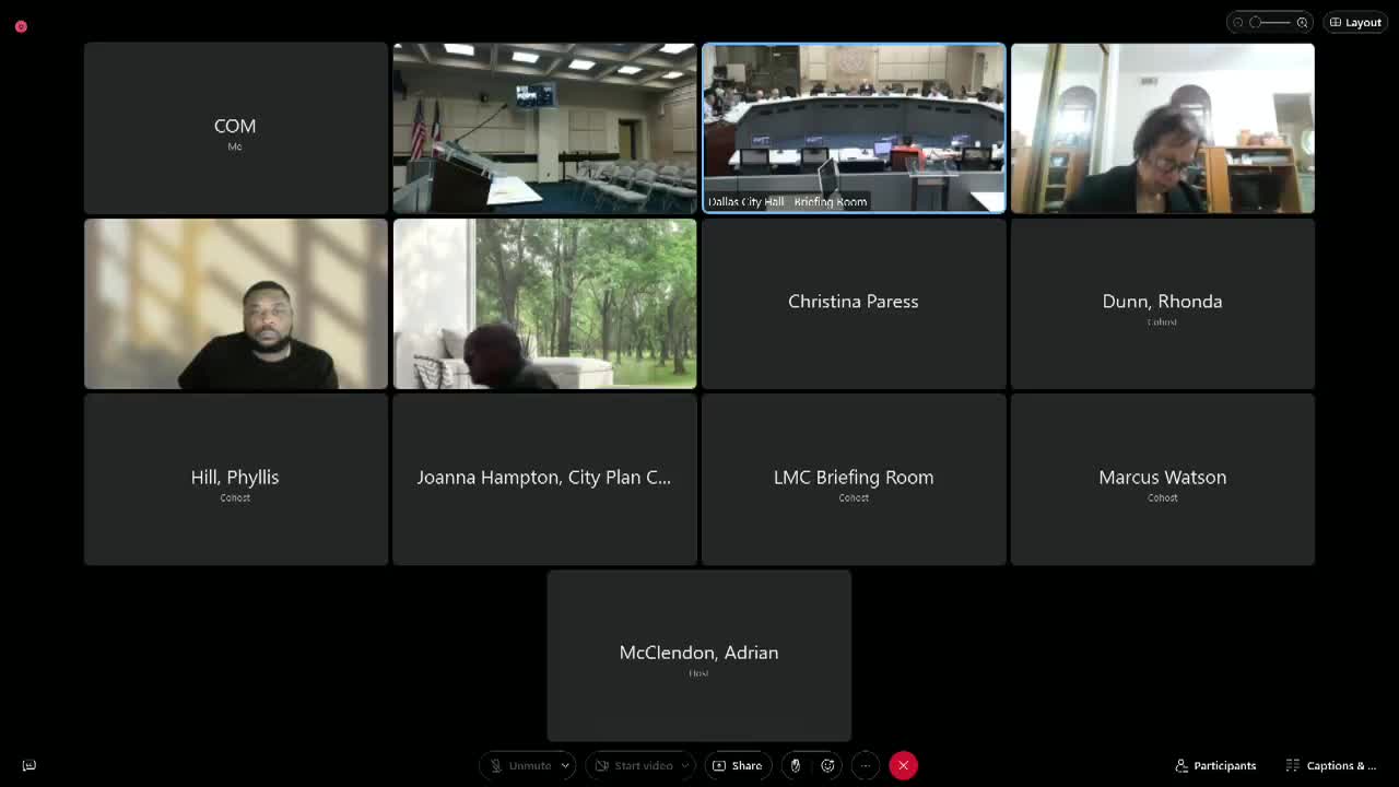 Commission approves two‑car garage at 210 N. Clinton with steeper roof and reduced overhang