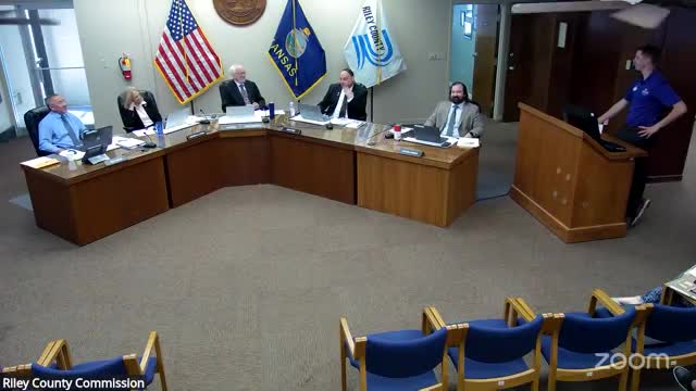 Megan announces baking contest inspired by Kolache failure at community meeting