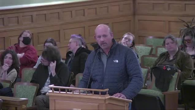 Bay City residents debate controversial resolution affecting police funding and operations
