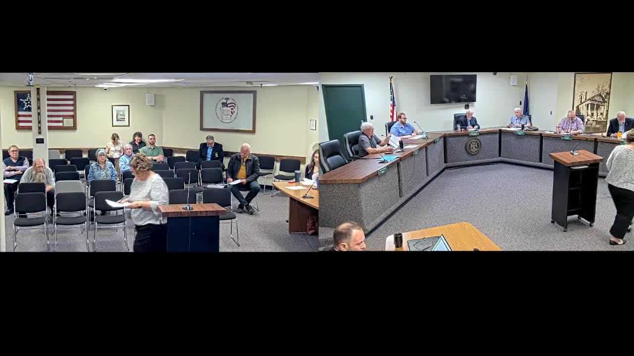 Finance director presents first‑quarter budget report; board approves final year of legacy finance software