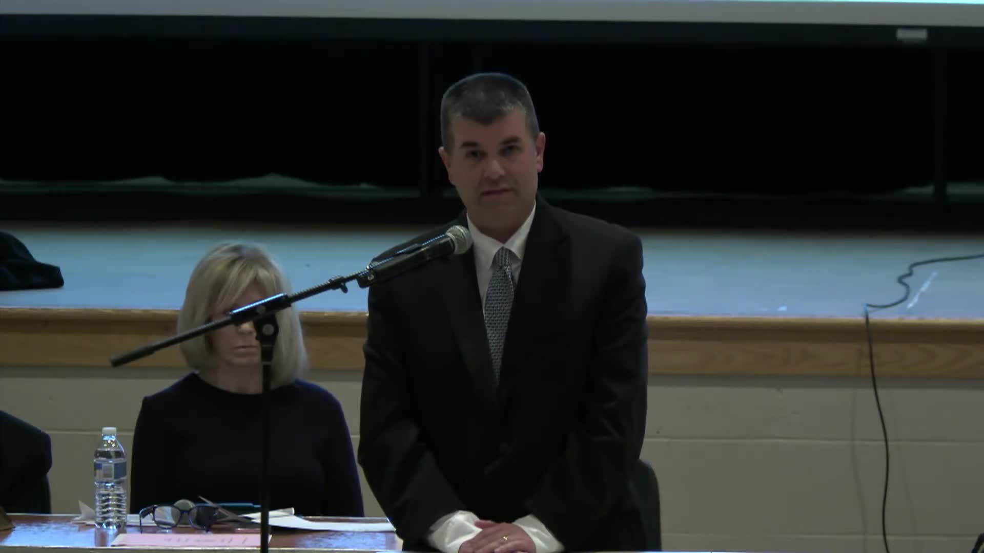 Community debates school location near former dump amid environmental concerns