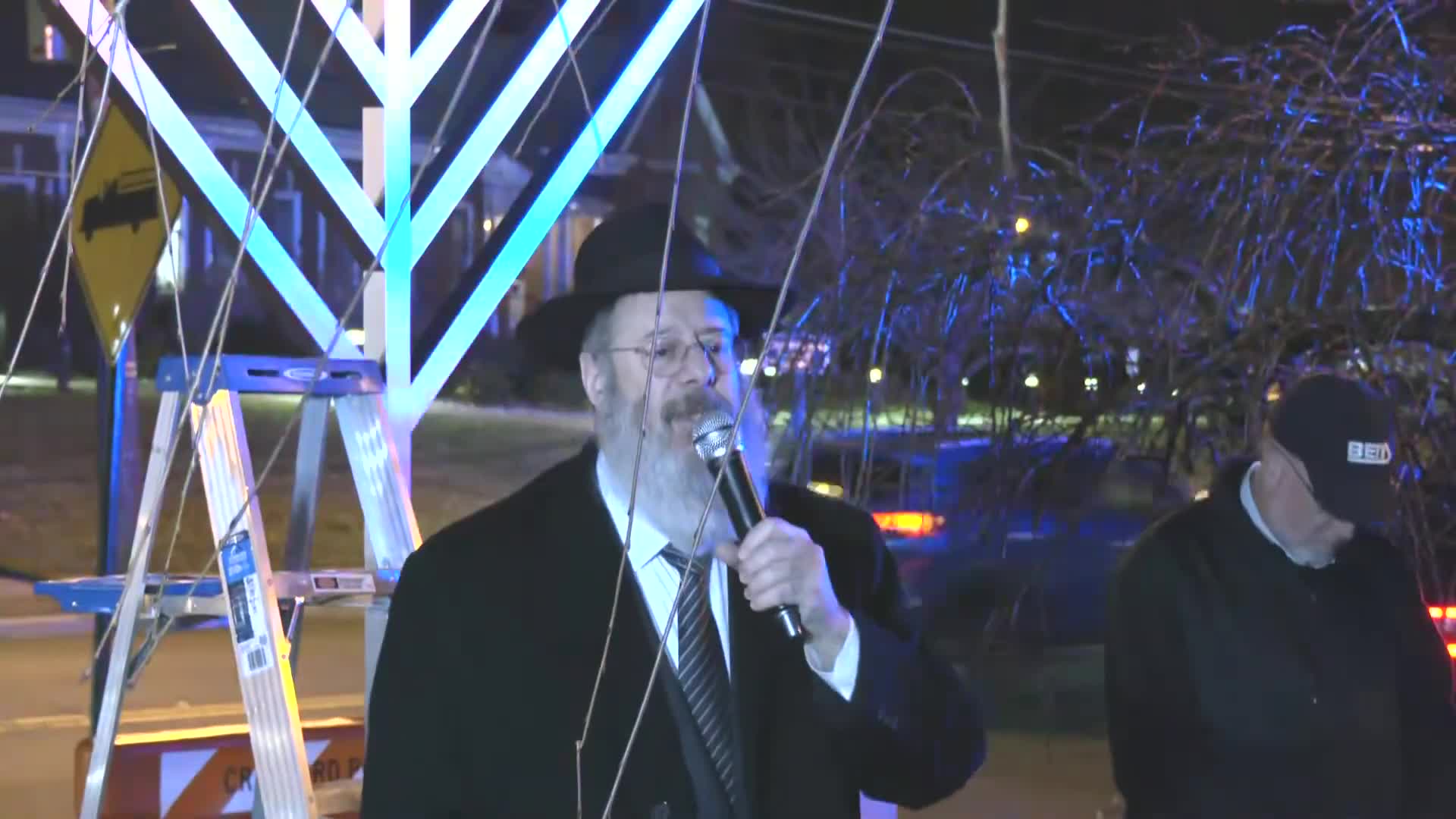 Rabbi discusses Hanukkah miracles and divine providence at community gathering