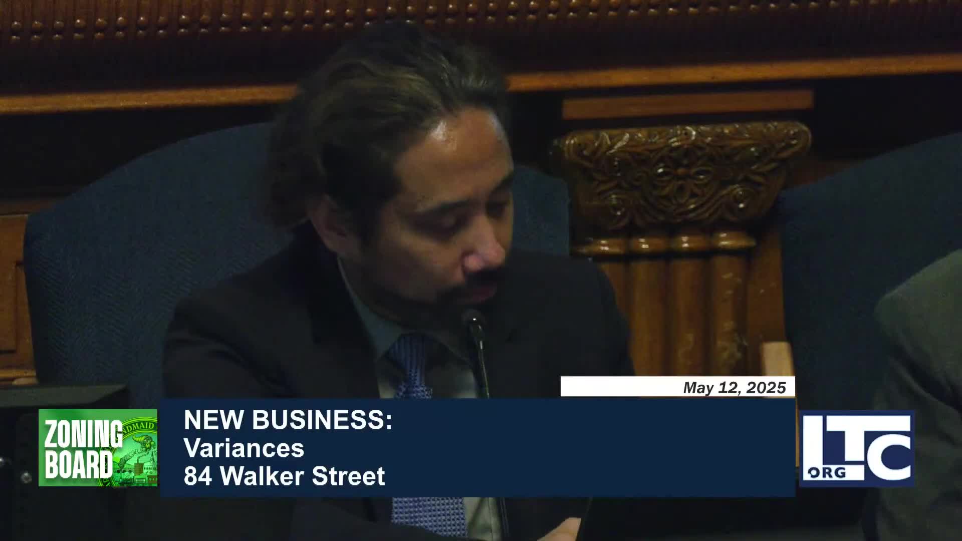 Local residents dispute paving permit at 8486 Walker Street hearing
