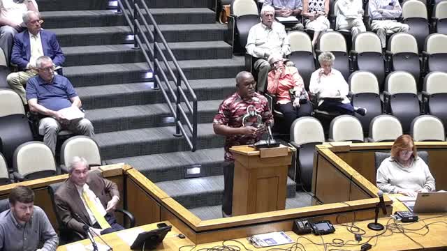 Developer Burton presents rezoning plans for city-owned site amid safety concerns
