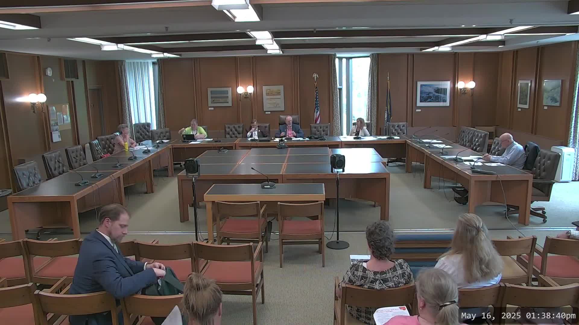 Committee approves previous meeting minutes and tentatively defers June meeting