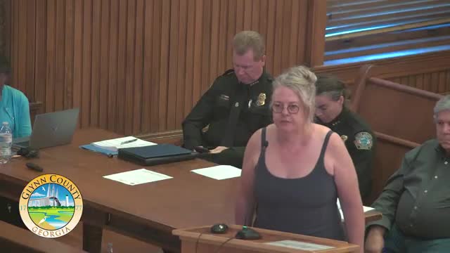 Commissioners approve abandonment of unopened alley at 241 Broadway Street; half to applicant parcel