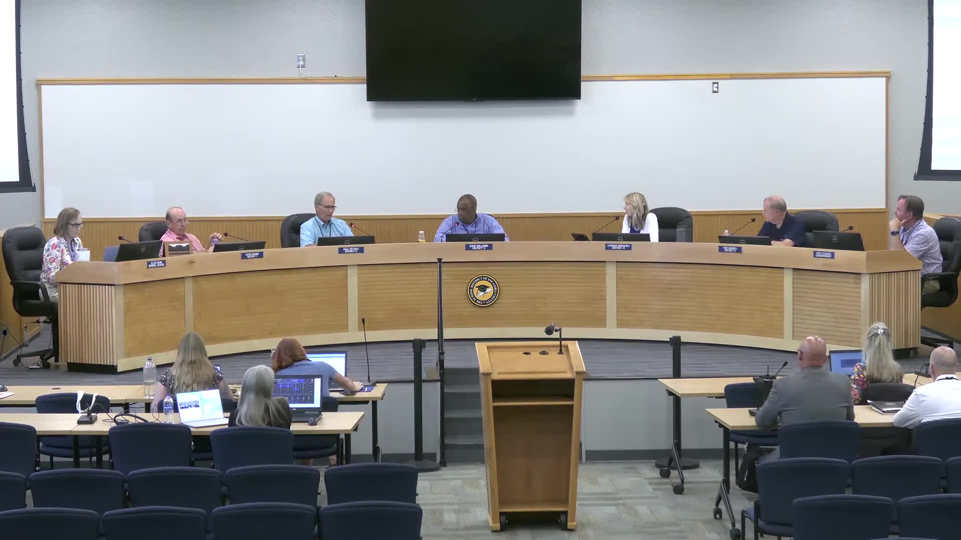 Board asks staff to study solar panels on school roofs; operations cite technical limits and existing pilot installations