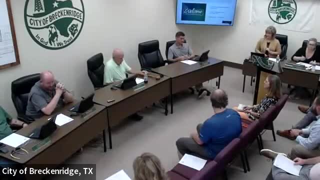 Pastor Melinda Lane leads prayer for Breckenridge city officials and community needs