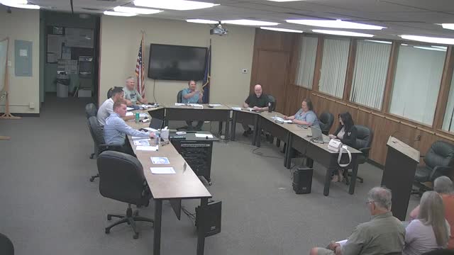 Herington students design window clings for City Hall; installation set for early June