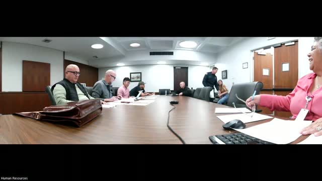 Captain Chris Sullivan discusses employee development at police department meeting