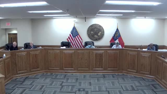 Spalding County splits on small‑lot agricultural rezonings; manufactured‑home exception receives no action